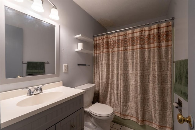 23 Spencer Rd Unit 20F, Boxborough, MA 01719 - bathroom with toilet, vanity, and tile patterned floors