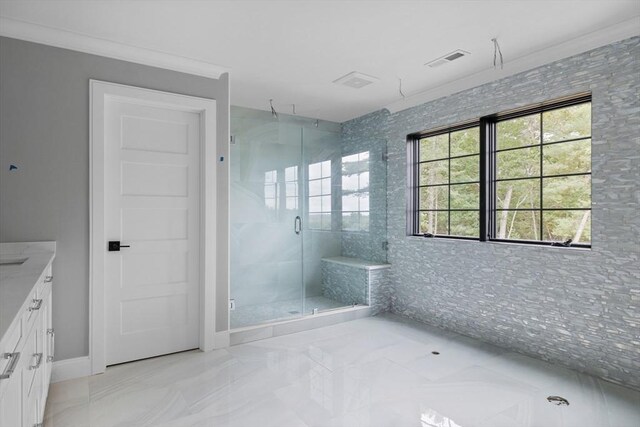 hallway featuring light wood-type flooring and crown molding