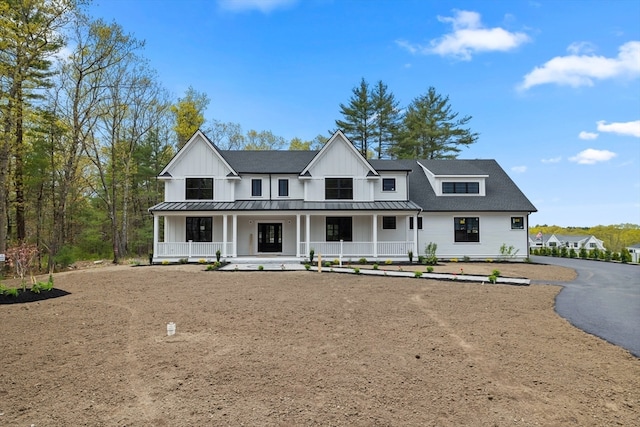 modern inspired farmhouse featuring a porch