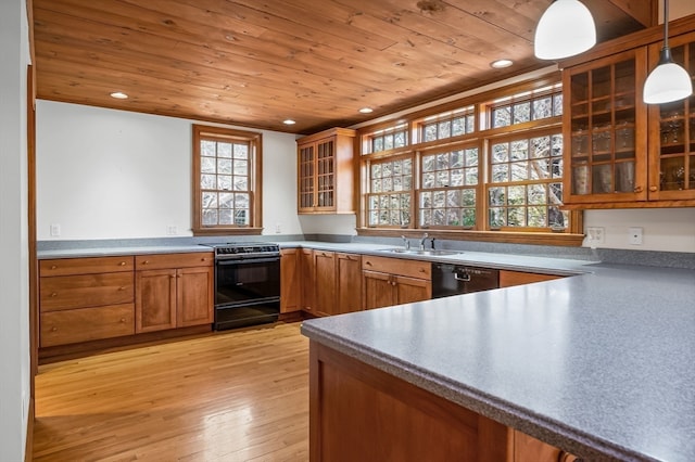 kitchen featuring wood ceiling, light hardwood / wood-style floors, hanging light fixtures, and black appliances