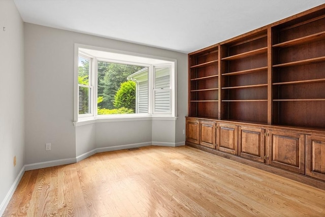 32 Twin Pond Ln, Sudbury, MA 01776 - unfurnished room featuring light wood-style flooring and baseboards
