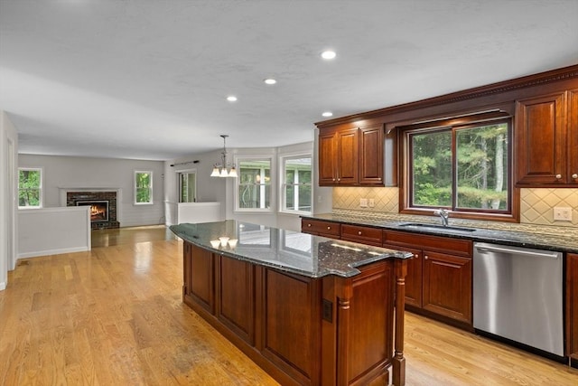32 Twin Pond Ln, Sudbury, MA 01776 - kitchen featuring dishwasher, a center island, tasteful backsplash, dark stone countertops, and recessed lighting
