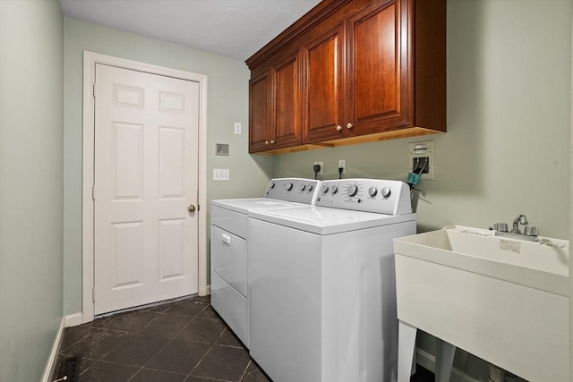 32 Twin Pond Ln, Sudbury, MA 01776 - laundry area with cabinet space, washer and dryer, and dark tile patterned flooring