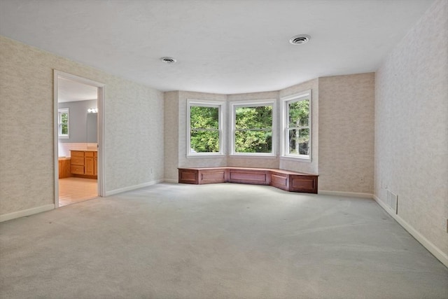 32 Twin Pond Ln, Sudbury, MA 01776 - unfurnished room featuring light carpet and wallpapered walls