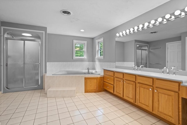 32 Twin Pond Ln, Sudbury, MA 01776 - bathroom with double vanity, tile patterned flooring, a bath, and a shower stall