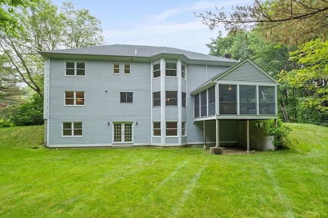 32 Twin Pond Ln, Sudbury, MA 01776 - back of house with a sunroom, a lawn, and a chimney