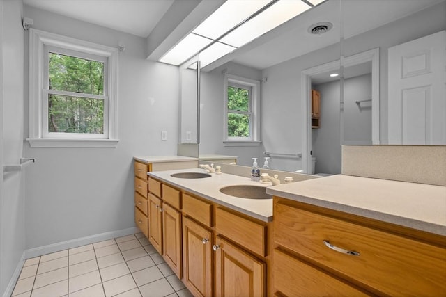 32 Twin Pond Ln, Sudbury, MA 01776 - bathroom featuring vanity, healthy amount of natural light, and tile patterned floors