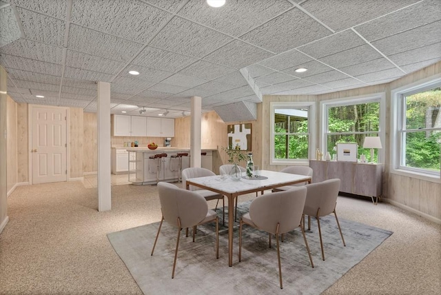 32 Twin Pond Ln, Sudbury, MA 01776 - dining space with light colored carpet, recessed lighting, and wood walls