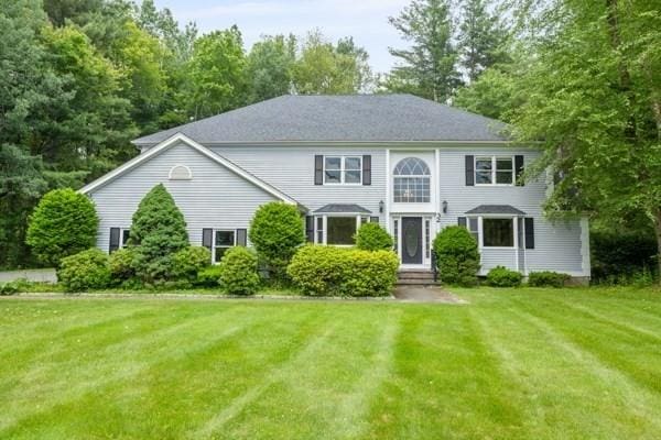 32 Twin Pond Ln, Sudbury, MA 01776 - view of front of home featuring a front lawn