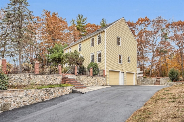 view of home's exterior with a garage