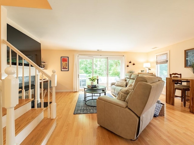 40 Bay Farm Unit 40, Duxbury, MA 02332 - living area with light wood-type flooring and stairway