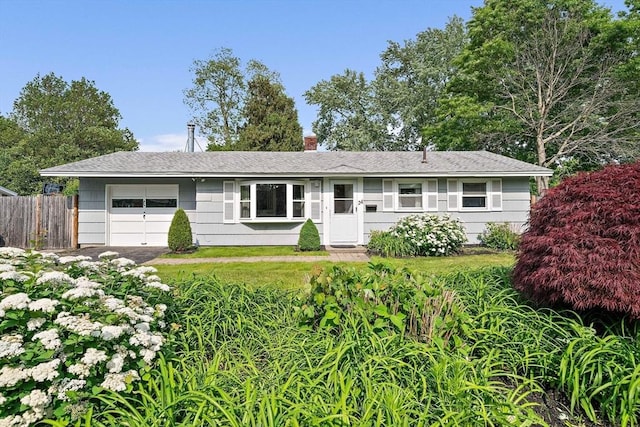 24 Hobson St, Brockton, MA 02302 - ranch-style house with an attached garage and a chimney