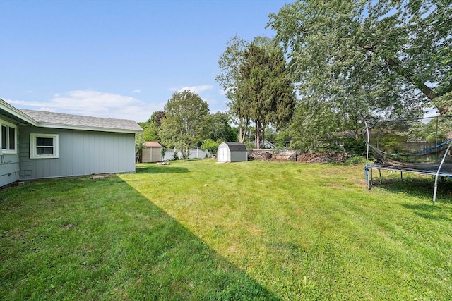 24 Hobson St, Brockton, MA 02302 - view of green lawn with a trampoline