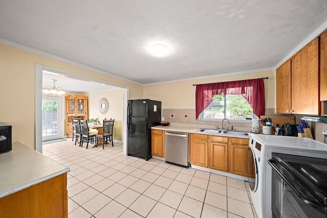 24 Hobson St, Brockton, MA 02302 - kitchen featuring stainless steel dishwasher, freestanding refrigerator, a sink, a chandelier, and light countertops