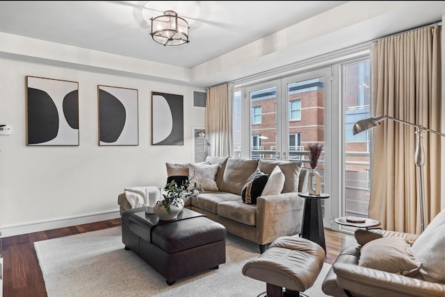 4 Battery Wharf Unit 4504, Boston, MA 02109 - living room featuring wood finished floors and a chandelier