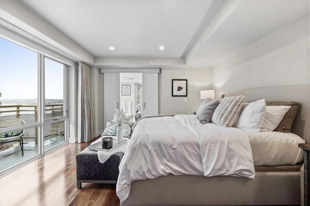4 Battery Wharf Unit 4504, Boston, MA 02109 - bedroom with wood finished floors and access to exterior