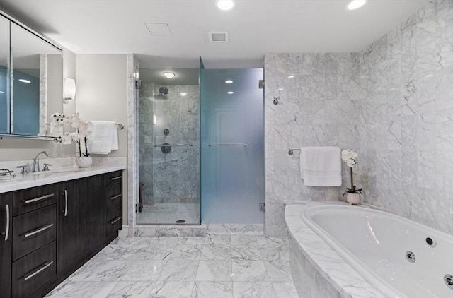 4 Battery Wharf Unit 4504, Boston, MA 02109 - bathroom featuring a jetted tub, a stall shower, vanity, marble finish floors, and recessed lighting