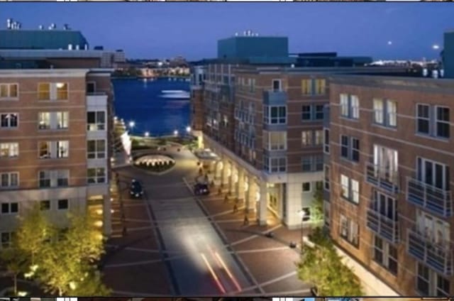 4 Battery Wharf Unit 4504, Boston, MA 02109 - property at twilight featuring a water view