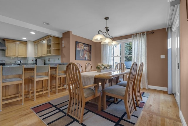 dining room featuring light hardwood / wood-style floors