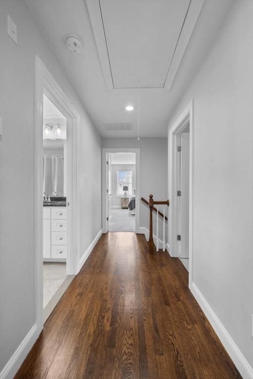 hall with dark hardwood / wood-style floors