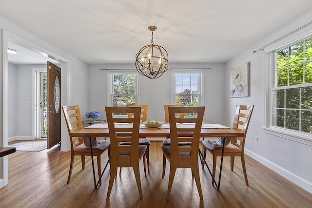 30 Brigham St, Hudson, MA 01749 - dining area featuring a chandelier and dark wood-style floors
