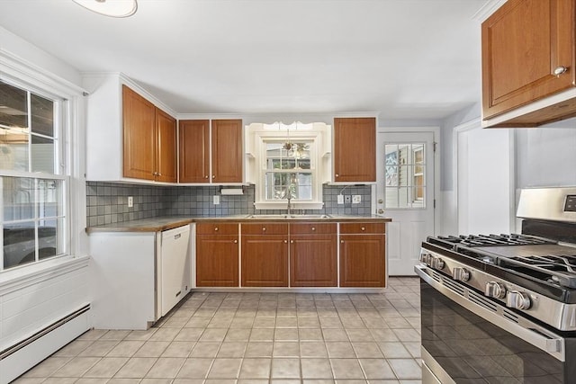 30 Brigham St, Hudson, MA 01749 - kitchen with stainless steel gas range oven, a baseboard radiator, white dishwasher, and backsplash