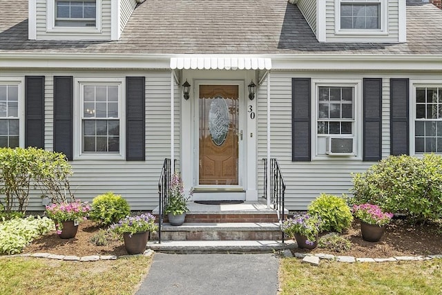30 Brigham St, Hudson, MA 01749 - doorway to property featuring roof with shingles