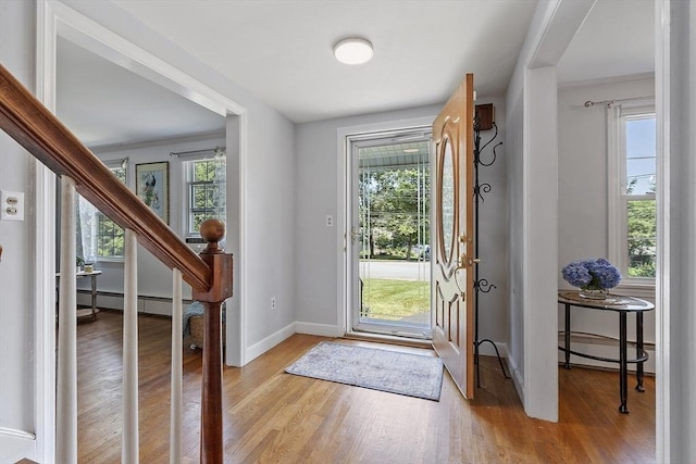 30 Brigham St, Hudson, MA 01749 - entryway featuring baseboard heating and wood finished floors