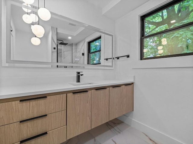 8 Wiswall Unit 8, Wellesley, MA 02482 - full bathroom featuring marble finish floors, a walk in shower, vanity, and baseboards