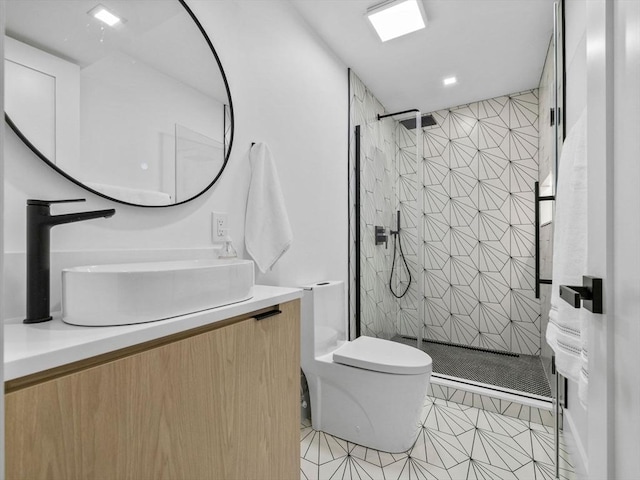 8 Wiswall Unit 8, Wellesley, MA 02482 - full bath featuring toilet, vanity, tile patterned flooring, and tiled shower