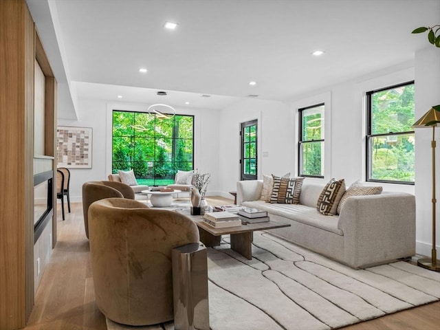 8 Wiswall Unit 8, Wellesley, MA 02482 - living area featuring plenty of natural light, light wood-style flooring, recessed lighting, and baseboards