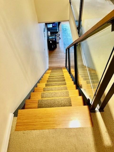 2 Earhart Unit 121, Cambridge, MA 02141 - stairway featuring wood finished floors