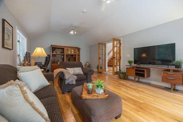 56 Burt St, Norton, MA 02766 - living room featuring ceiling fan, wood finished floors, stairway, and lofted ceiling
