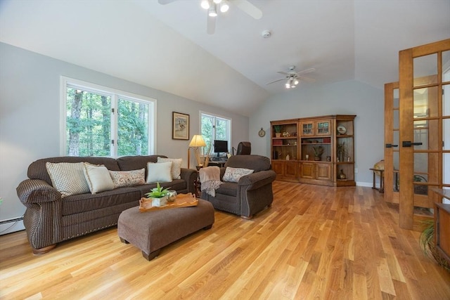 56 Burt St, Norton, MA 02766 - living area with ceiling fan, light wood finished floors, and vaulted ceiling
