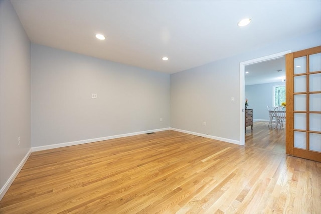 56 Burt St, Norton, MA 02766 - empty room featuring light wood-style floors and recessed lighting