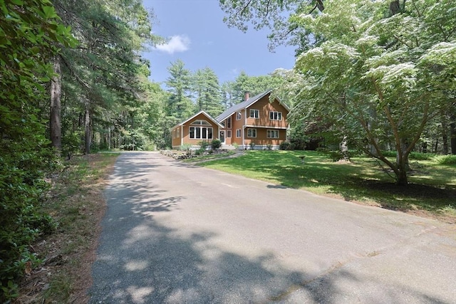 56 Burt St, Norton, MA 02766 - chalet / cabin featuring a chimney, driveway, and a front lawn