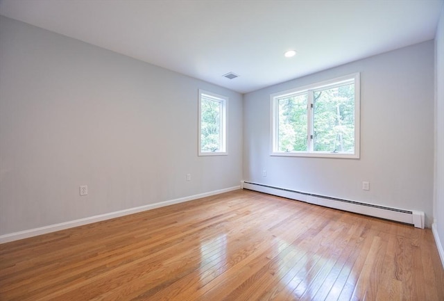 56 Burt St, Norton, MA 02766 - unfurnished room featuring a baseboard radiator, light wood-type flooring, and recessed lighting