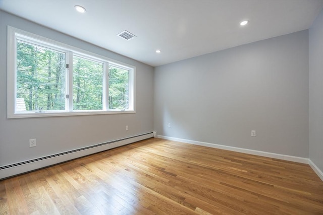 56 Burt St, Norton, MA 02766 - spare room featuring baseboard heating, plenty of natural light, light wood-style flooring, and recessed lighting