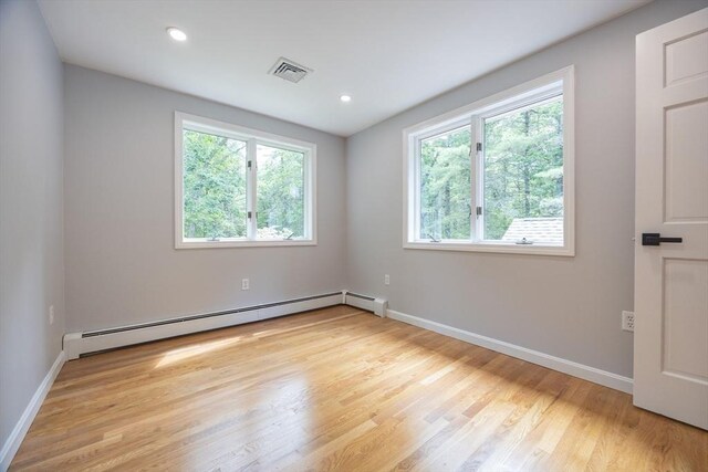 56 Burt St, Norton, MA 02766 - spare room with healthy amount of natural light, baseboard heating, light wood finished floors, and recessed lighting