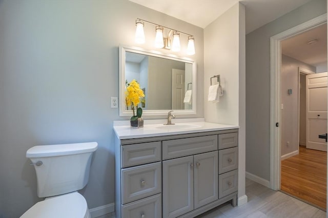 56 Burt St, Norton, MA 02766 - bathroom with vanity and wood finished floors
