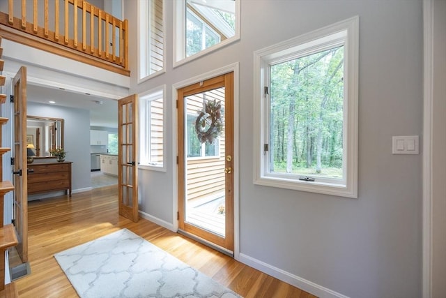 56 Burt St, Norton, MA 02766 - entrance foyer featuring healthy amount of natural light and light wood-style flooring
