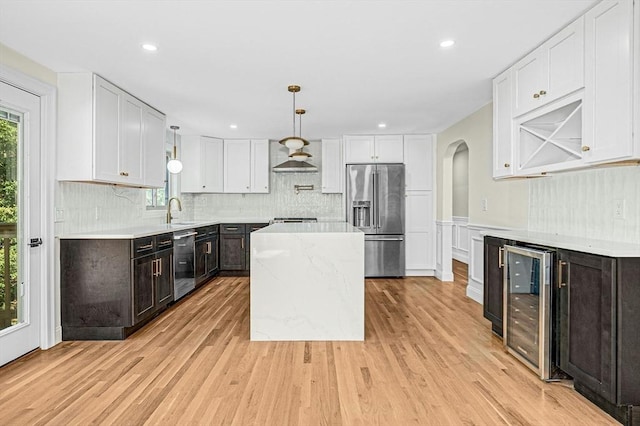 30 Twilight Dr, Foxboro, MA 02035 - kitchen featuring stainless steel appliances, beverage cooler, plenty of natural light, white cabinetry, and recessed lighting