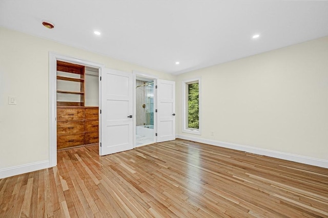 30 Twilight Dr, Foxboro, MA 02035 - unfurnished bedroom featuring a spacious closet, light wood-style flooring, a closet, recessed lighting, and ensuite bathroom
