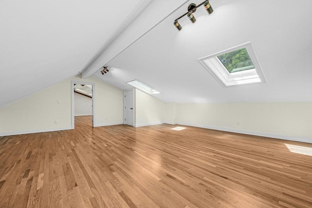 30 Twilight Dr, Foxboro, MA 02035 - bonus room featuring a skylight and light wood-style floors