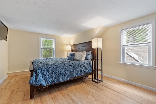 12 Billings St, Acton, MA 01720 - bedroom with light wood-type flooring and baseboards