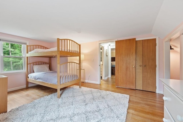 12 Billings St, Acton, MA 01720 - bedroom featuring light wood-style floors, baseboards, and vaulted ceiling