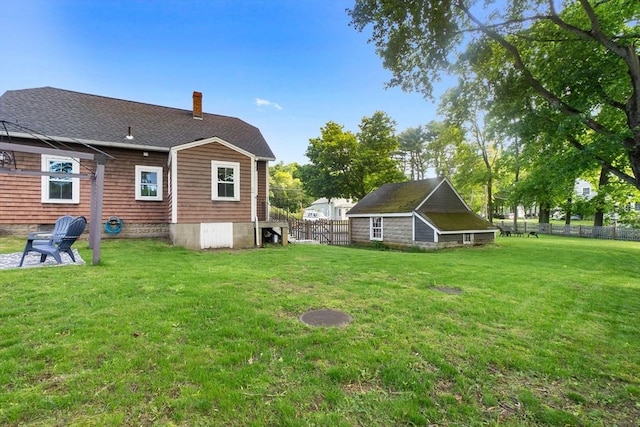 50 Wethersfield, Rowley, MA 01969 - back of house with a chimney and an outdoor structure