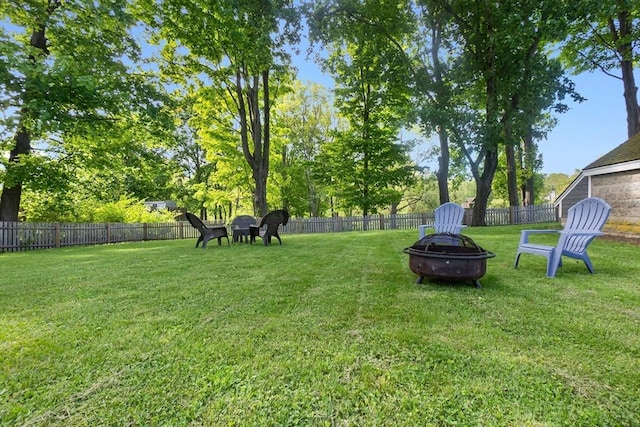 50 Wethersfield, Rowley, MA 01969 - view of yard featuring an outdoor fire pit