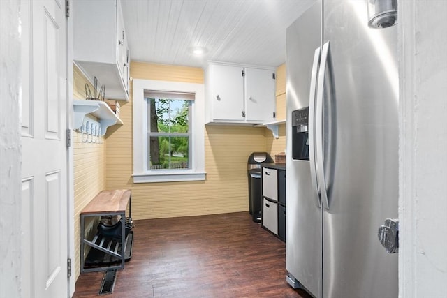50 Wethersfield, Rowley, MA 01969 - kitchen with stainless steel fridge, dark wood finished floors, white cabinetry, wooden walls, and wooden ceiling