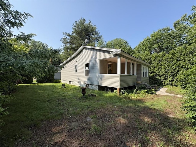 202 Millers Falls Rd, Montague, MA 01376 - view of property exterior featuring a yard